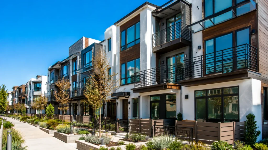 Modern townhouse row in bright sunlight